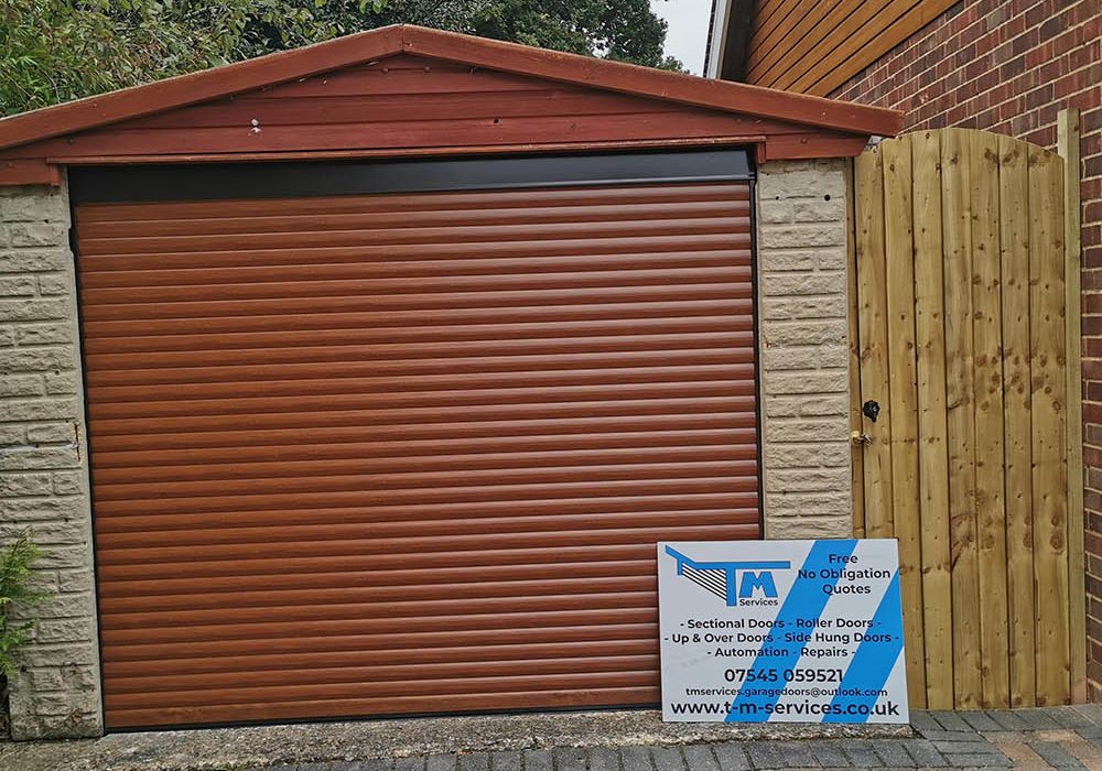 Newly intstalled brown shutter garage door